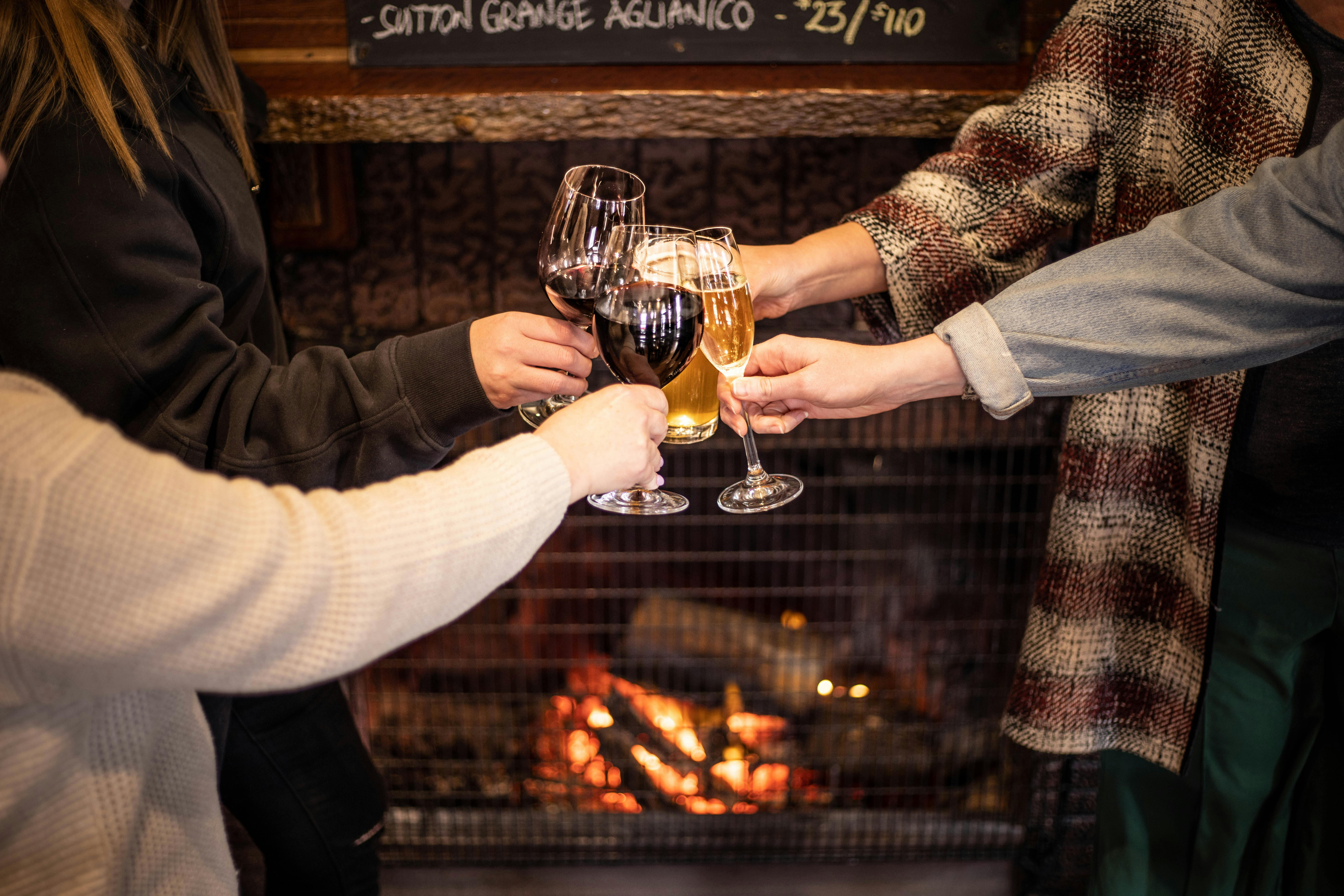 Drinks in front of the fireplace.