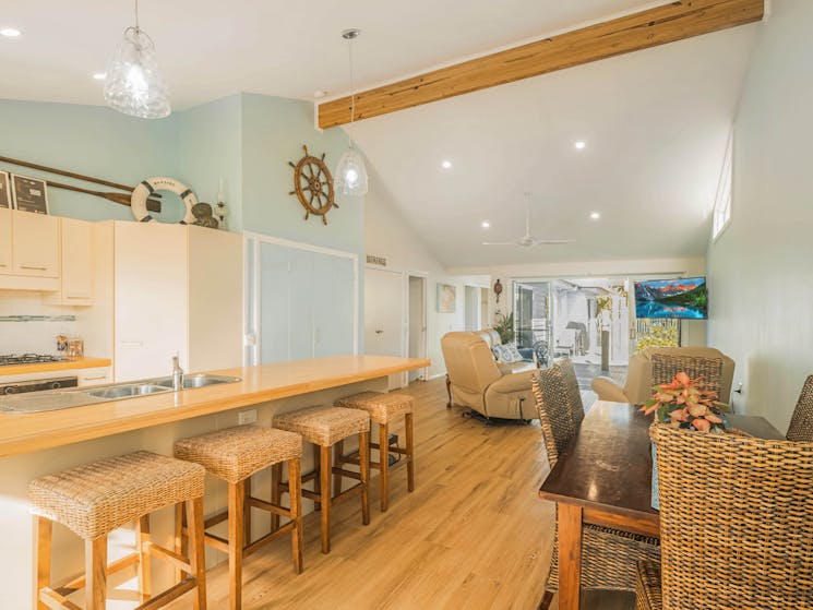 Accessible accommodation Seafarers Diamond Beach open plan living areas - kitchen/dining/lounge room
