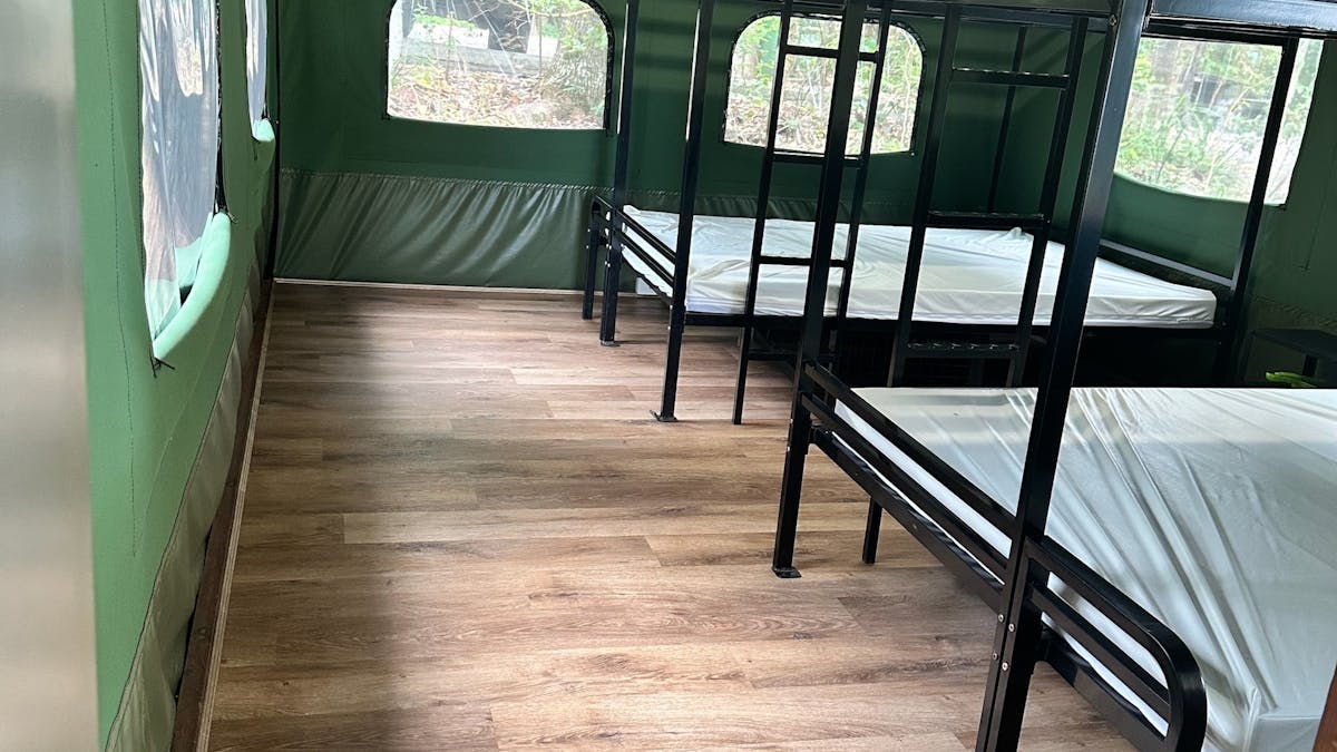 Image shows the interior of the Safari Tents with bunk beds Image shows the interior of the Safari Tents with bunk beds