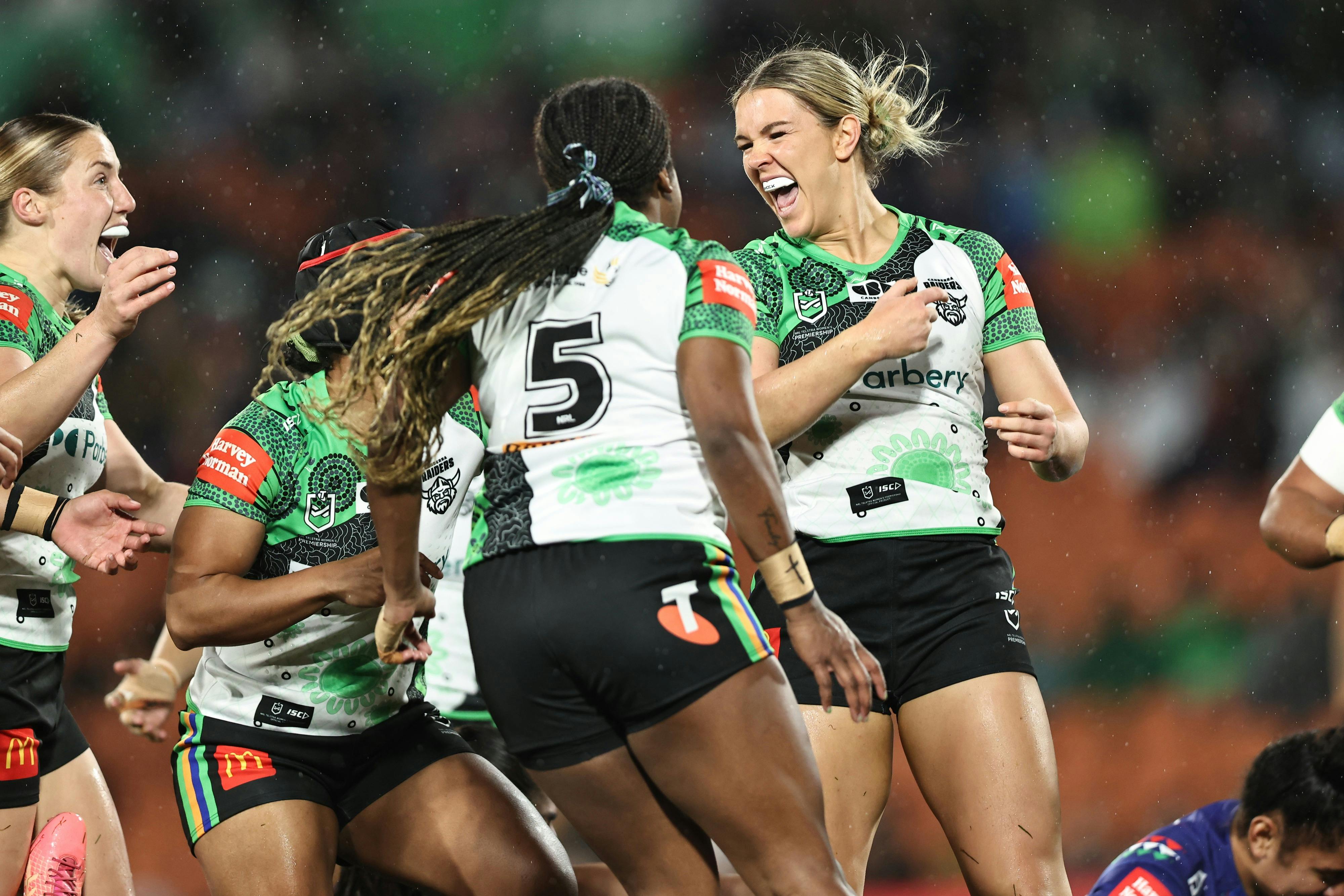 Raiders NRLW player Jordyn Preston celebrating a try.