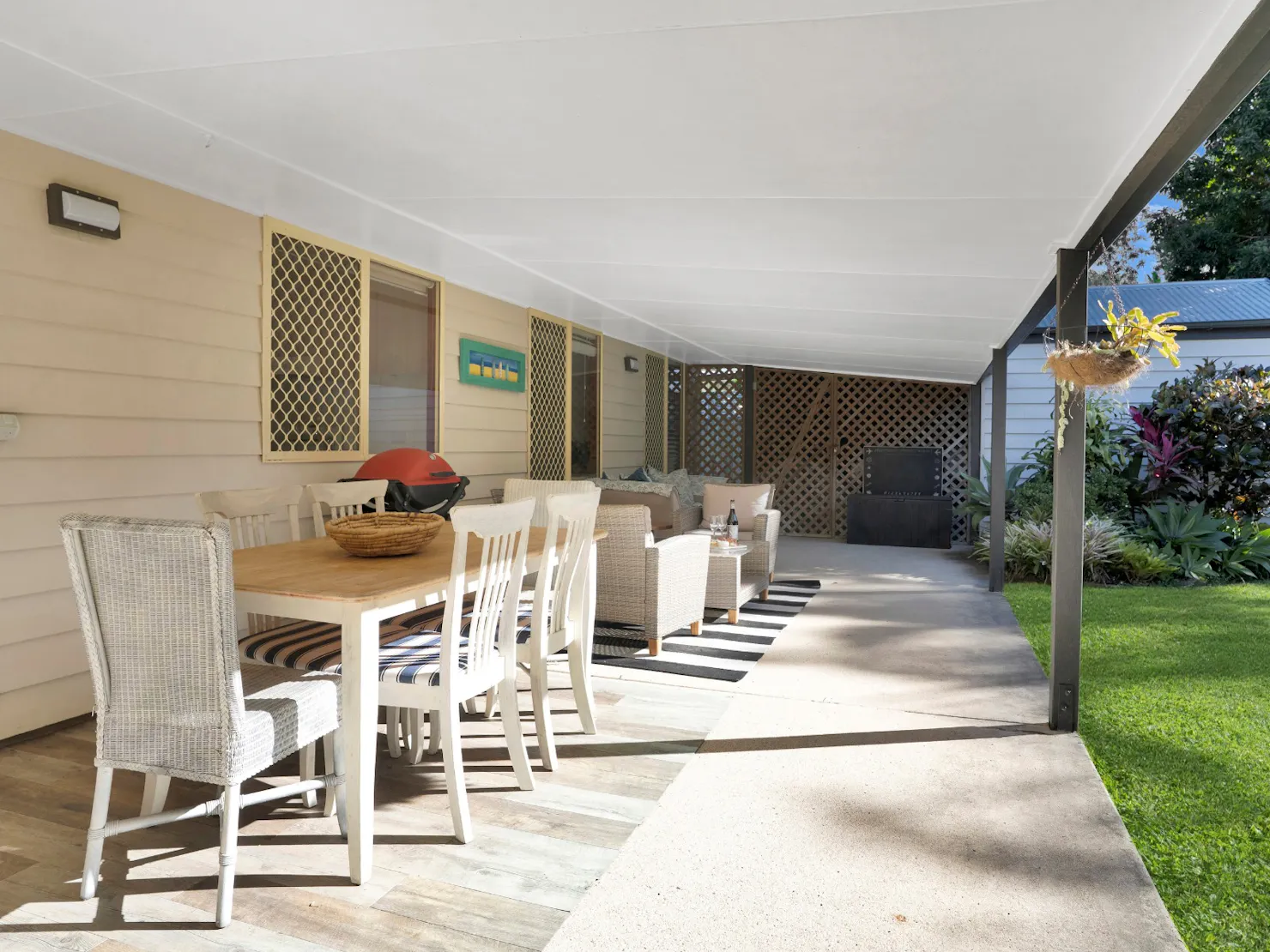 Balcony with outdoor dining, lounge area and BBQ