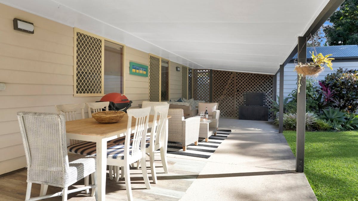 Balcony with outdoor dining, lounge area and BBQ