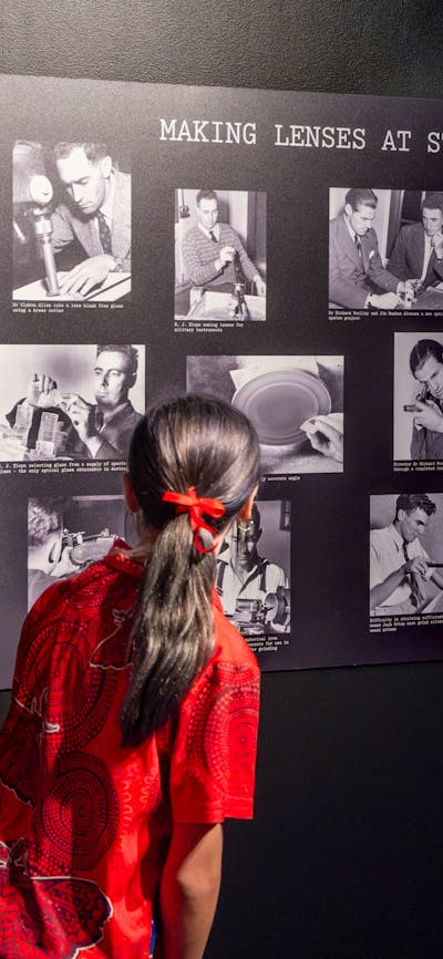 A young person exploring the Outer Space: Stromlo to the Stars exhibition