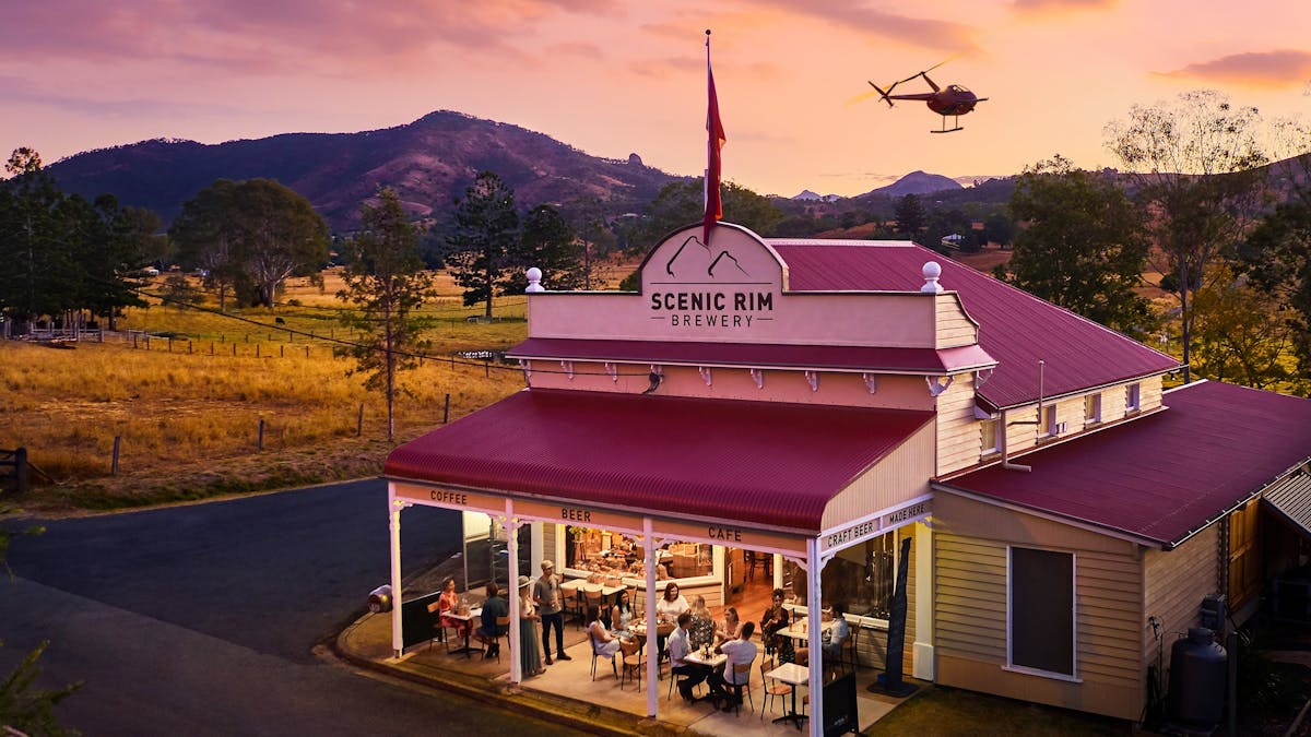 Helicopter flying over the Scenic Rim Brewery, one of the stops on our Wild West Pub Crawl.