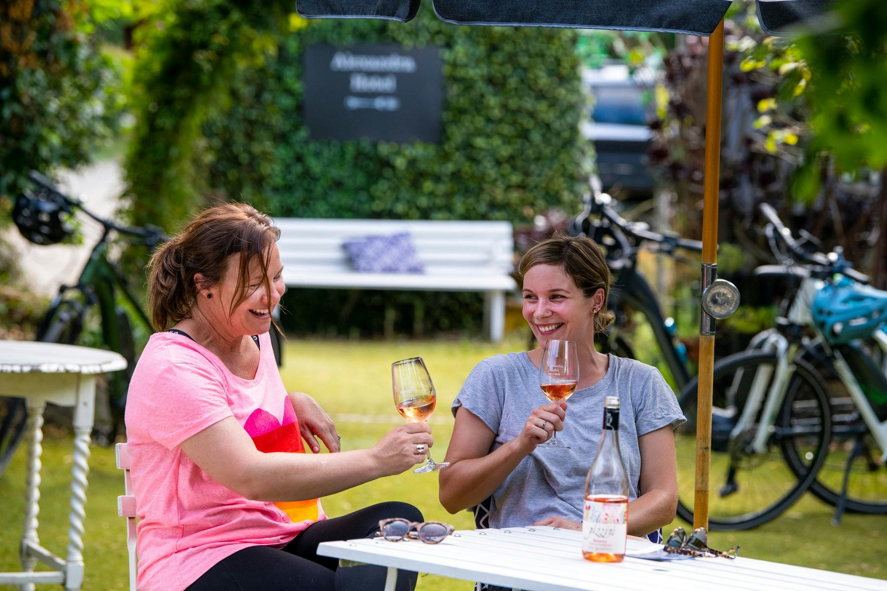 Guests enjoying a relaxing afternoon in the hotel courtyard