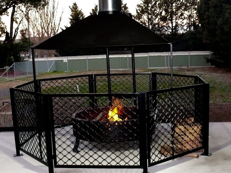 Firepit with safety enclosure