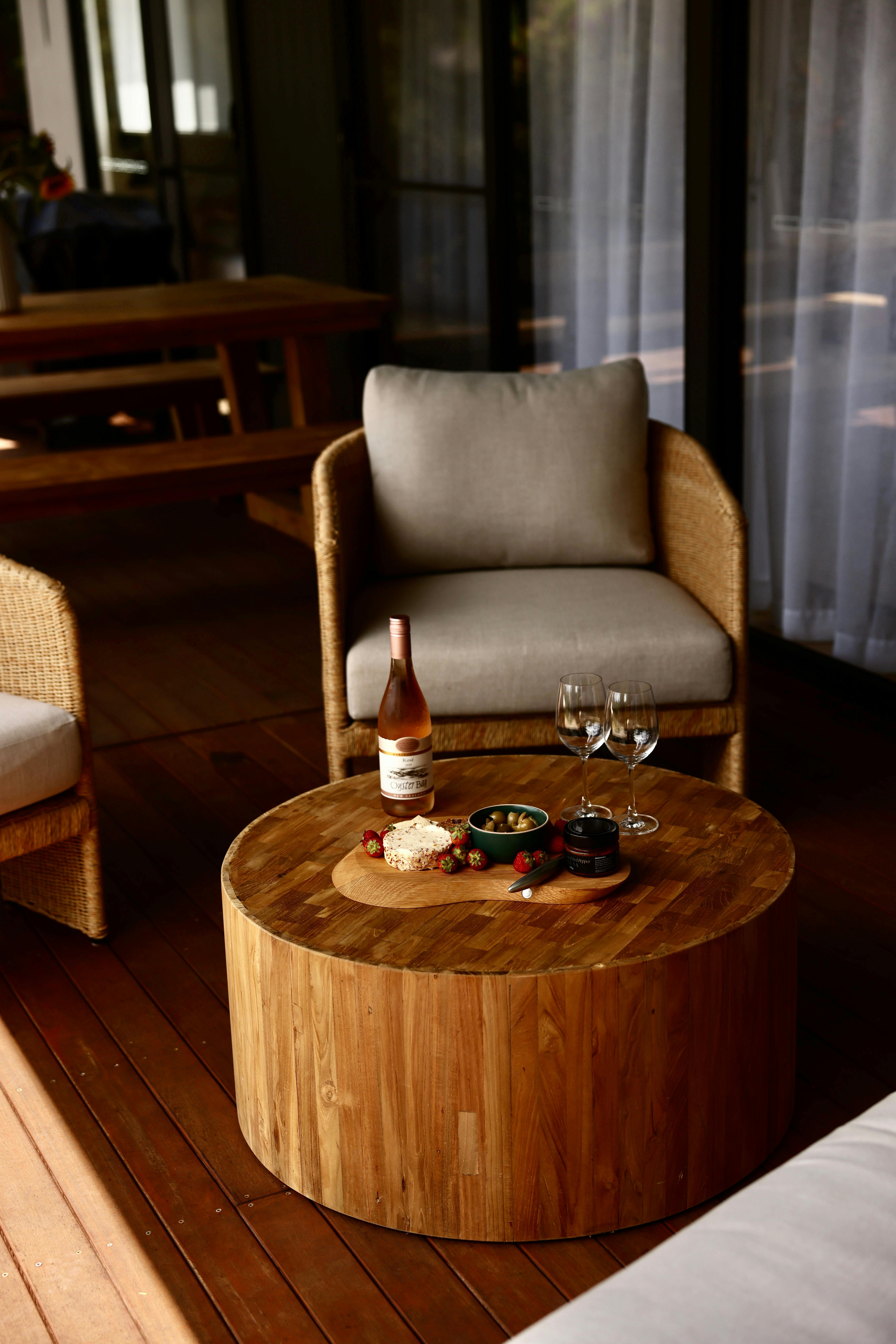 Relax on the comfy outdoor setting enjoying ocean glimpses to Kirra Beach