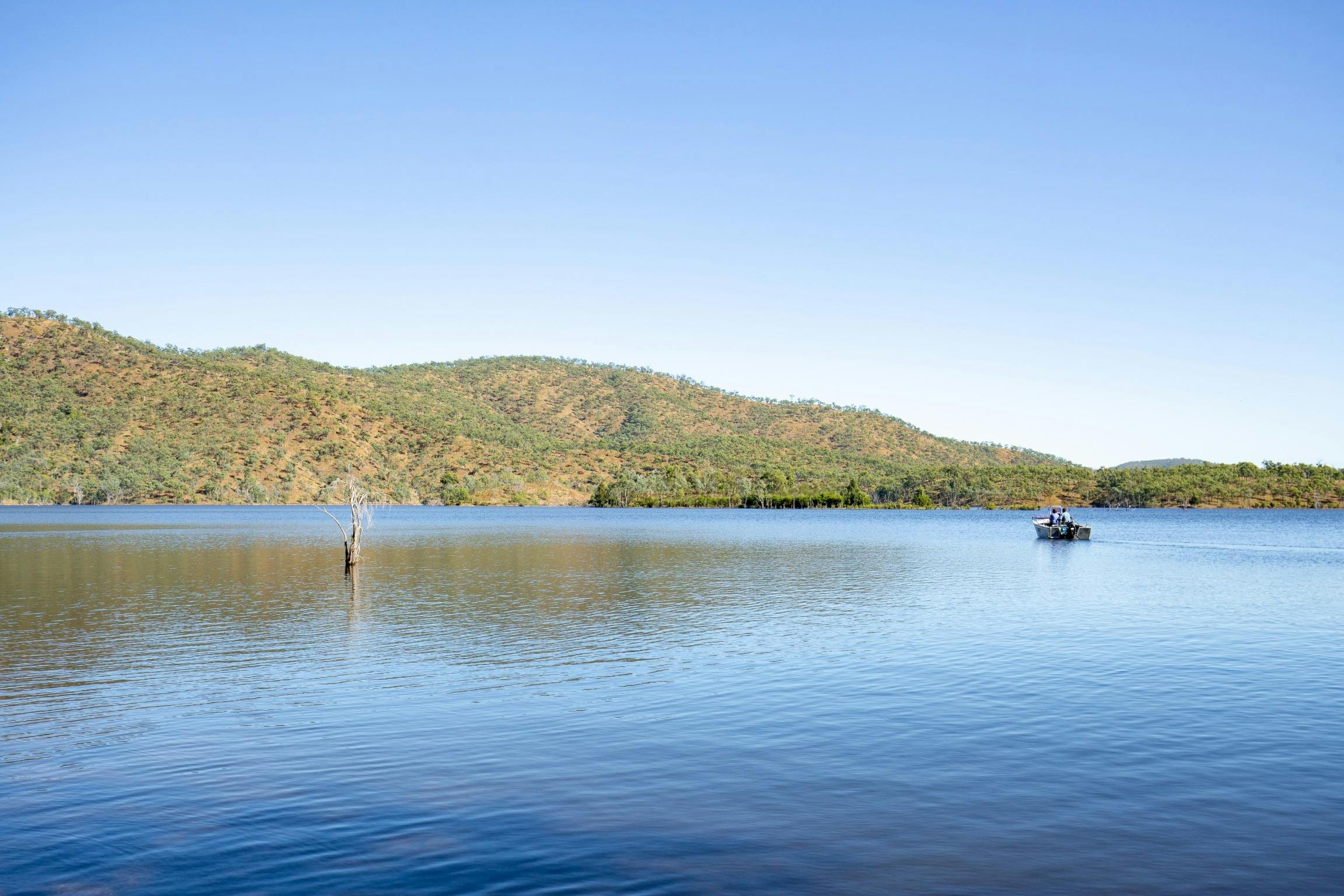 Small fishing boat on Lake Cania
