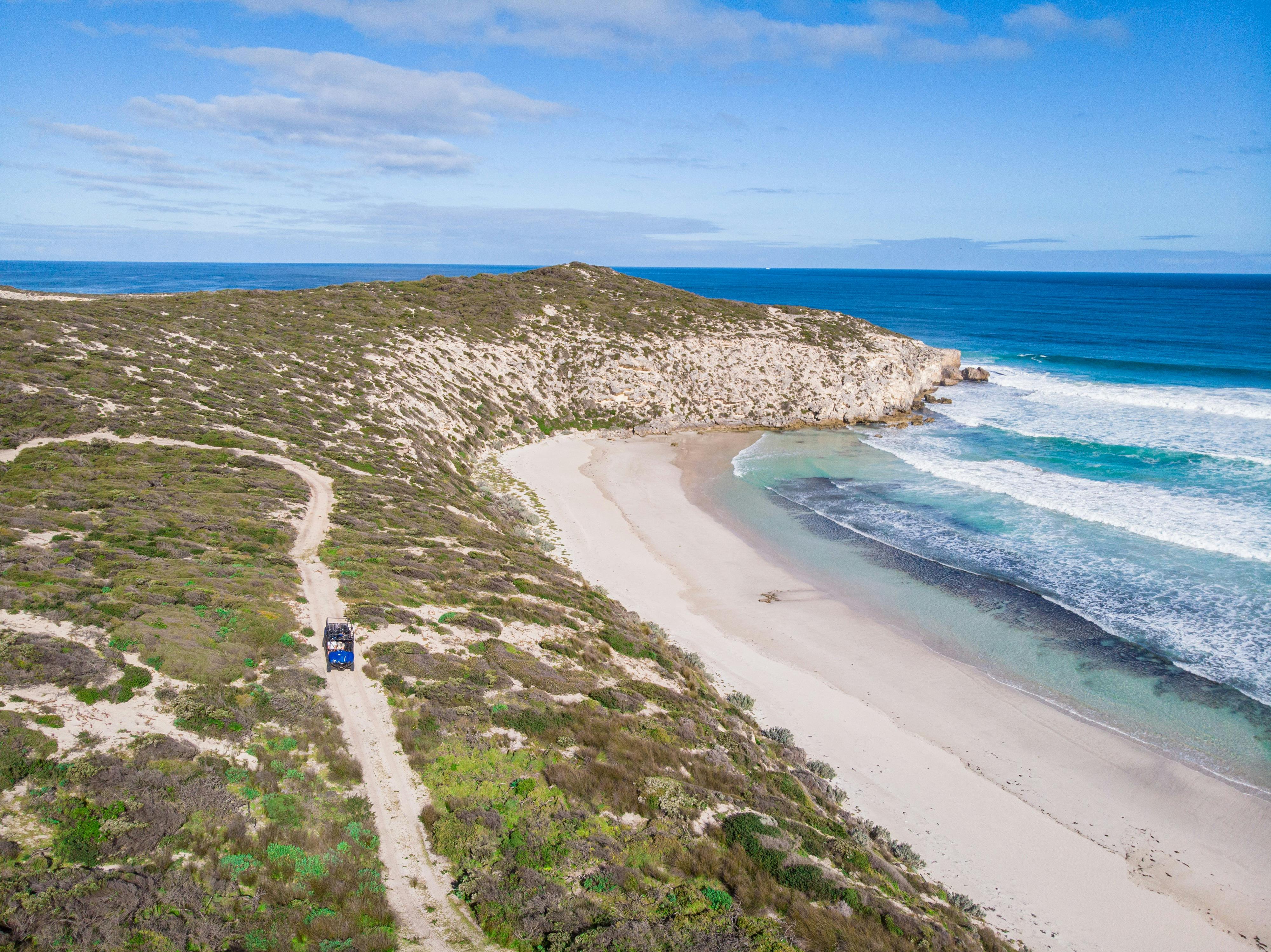 Buggy at beach with turquoise water