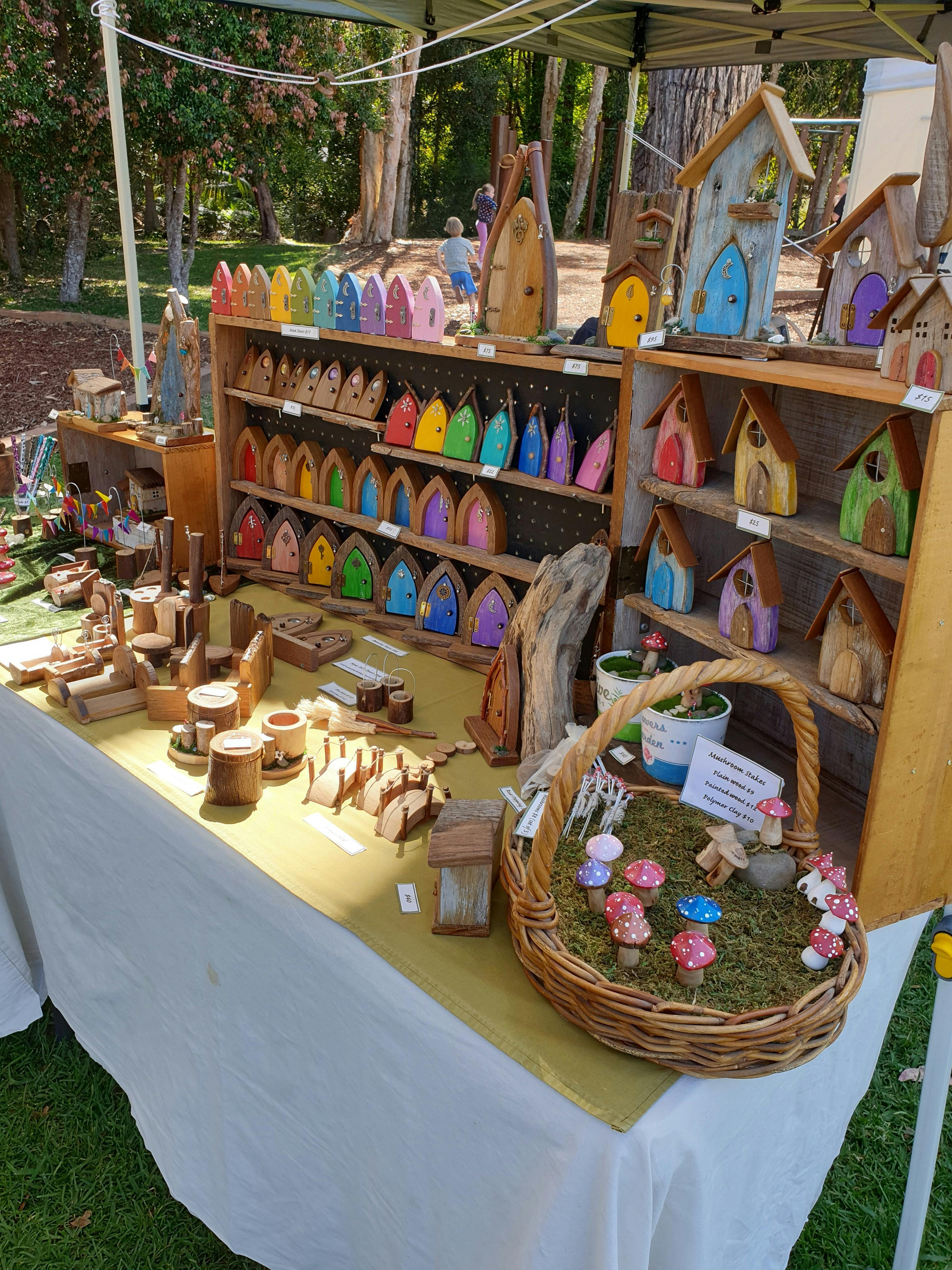 Hand crafted wooden fairy houses, fairy doors from fallen branches and upcycled timber
