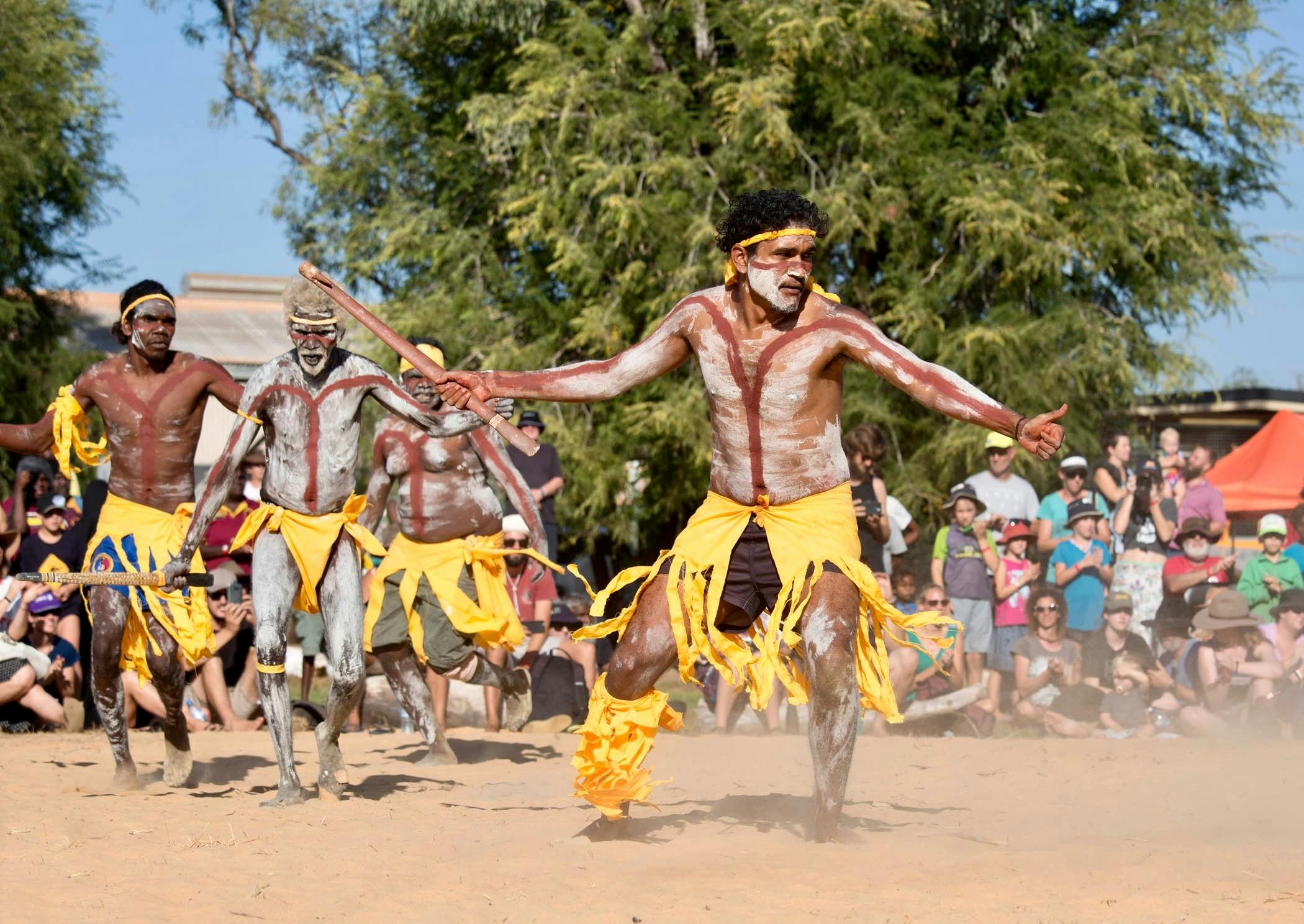 Indigenous men dancing traditional dances