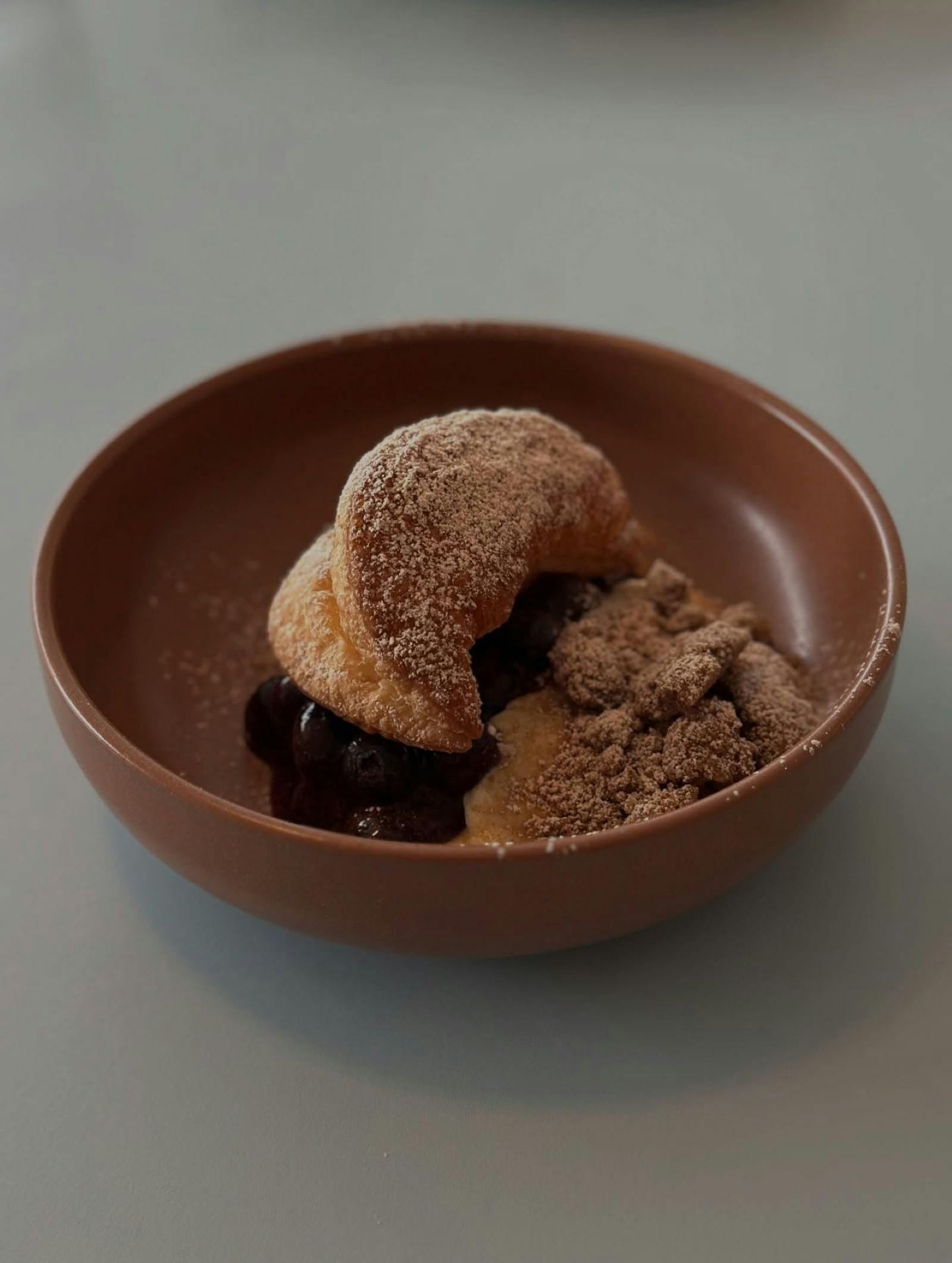 delicious dessert in a brown bowl
