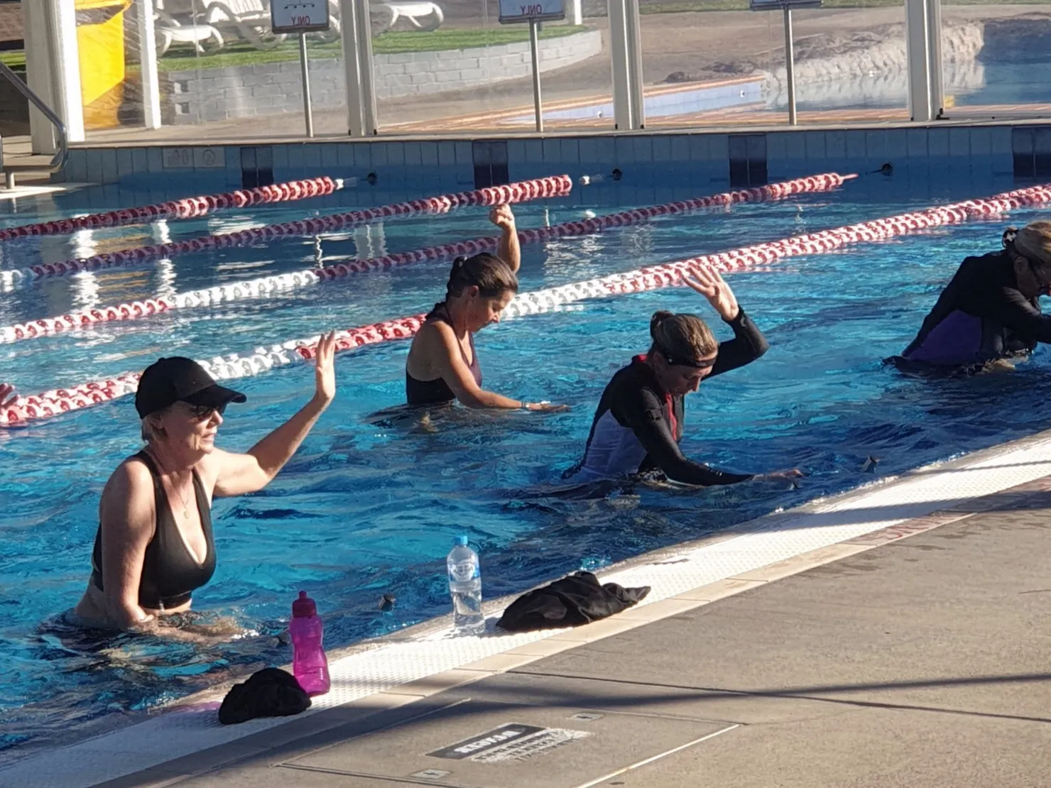 group water cycling in stand one hand position