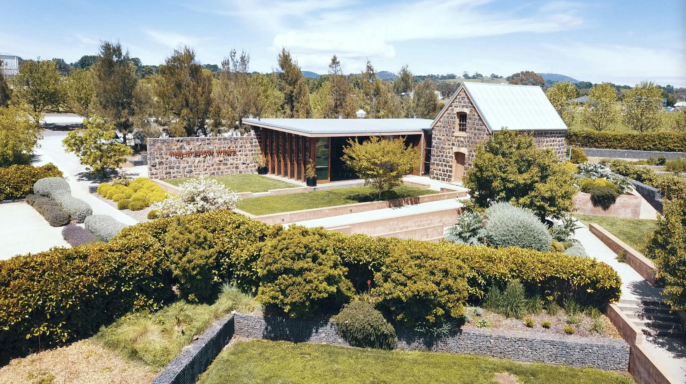 A drone shot of Philip Shaw Wines Bluestone Cellar door and gardens slightly in colour change