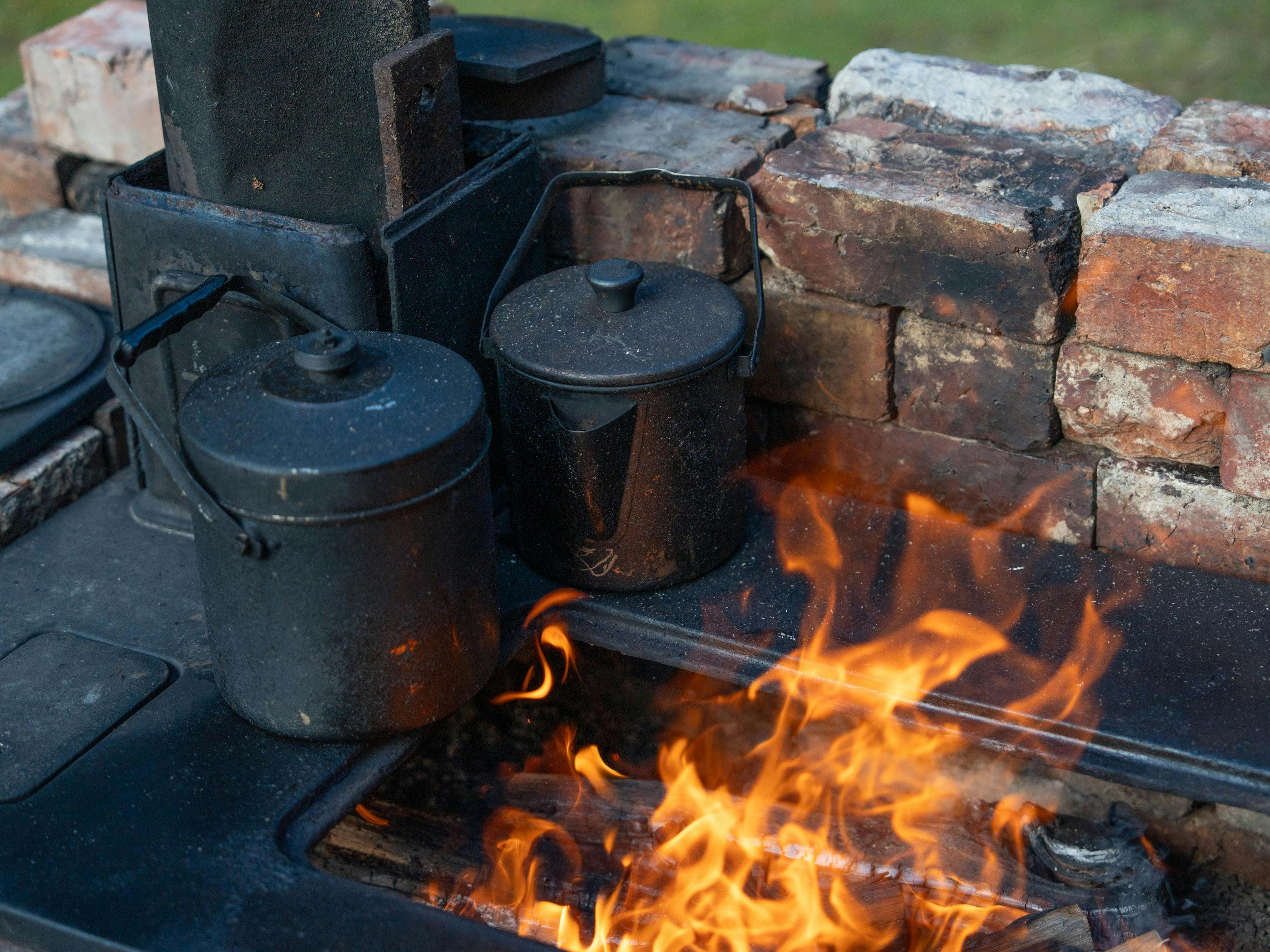 Campfire flaming with 2 billies
