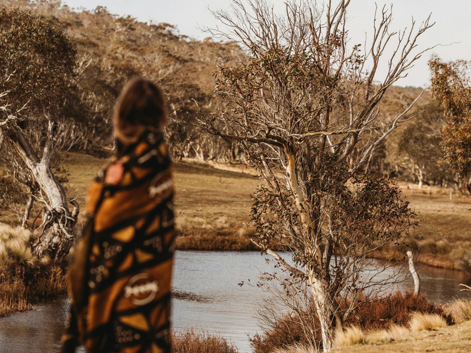 Platypus watching by Numeralla river, perfect for trout fishing.