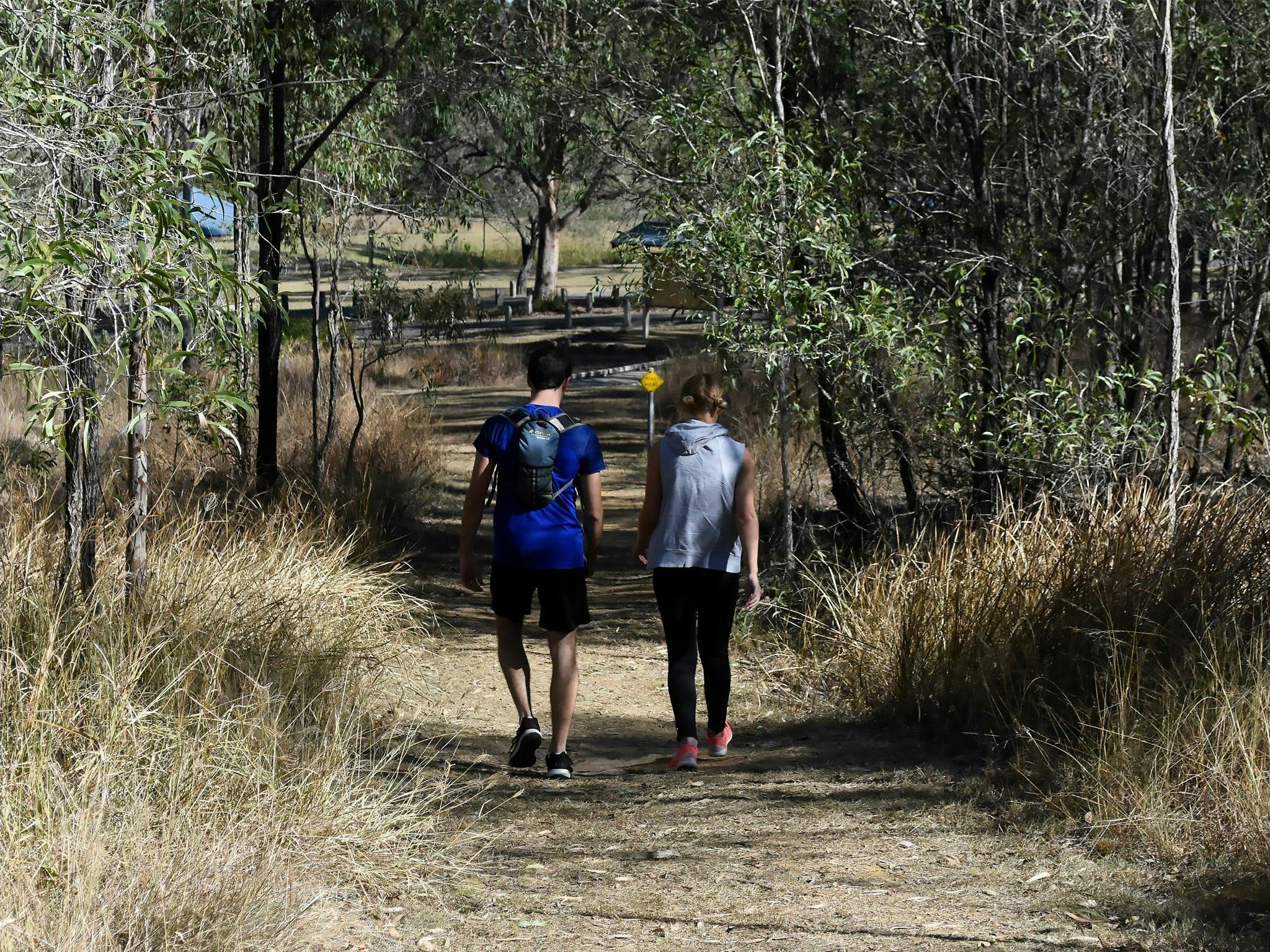 Two people walking on Gamlen Circuit Two people walking on Gamlen Circuit