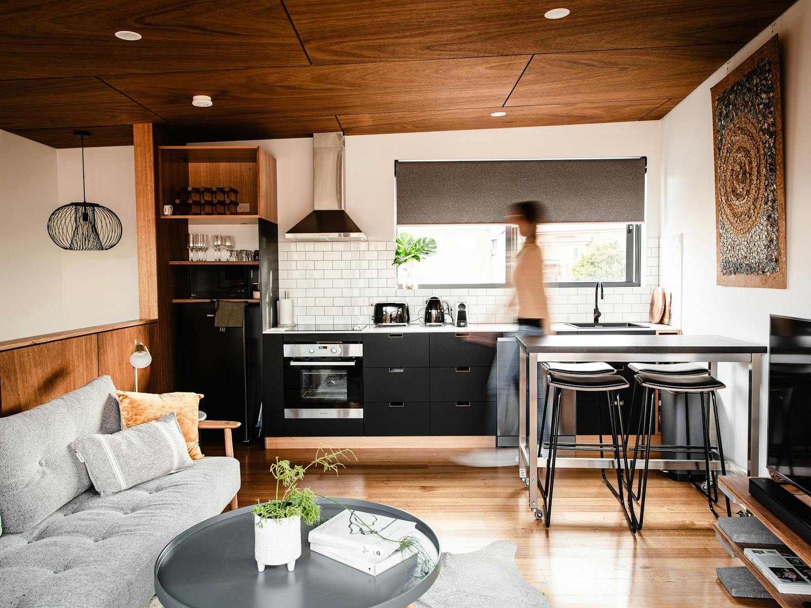 Photo shows the kitchen/living/dining area.