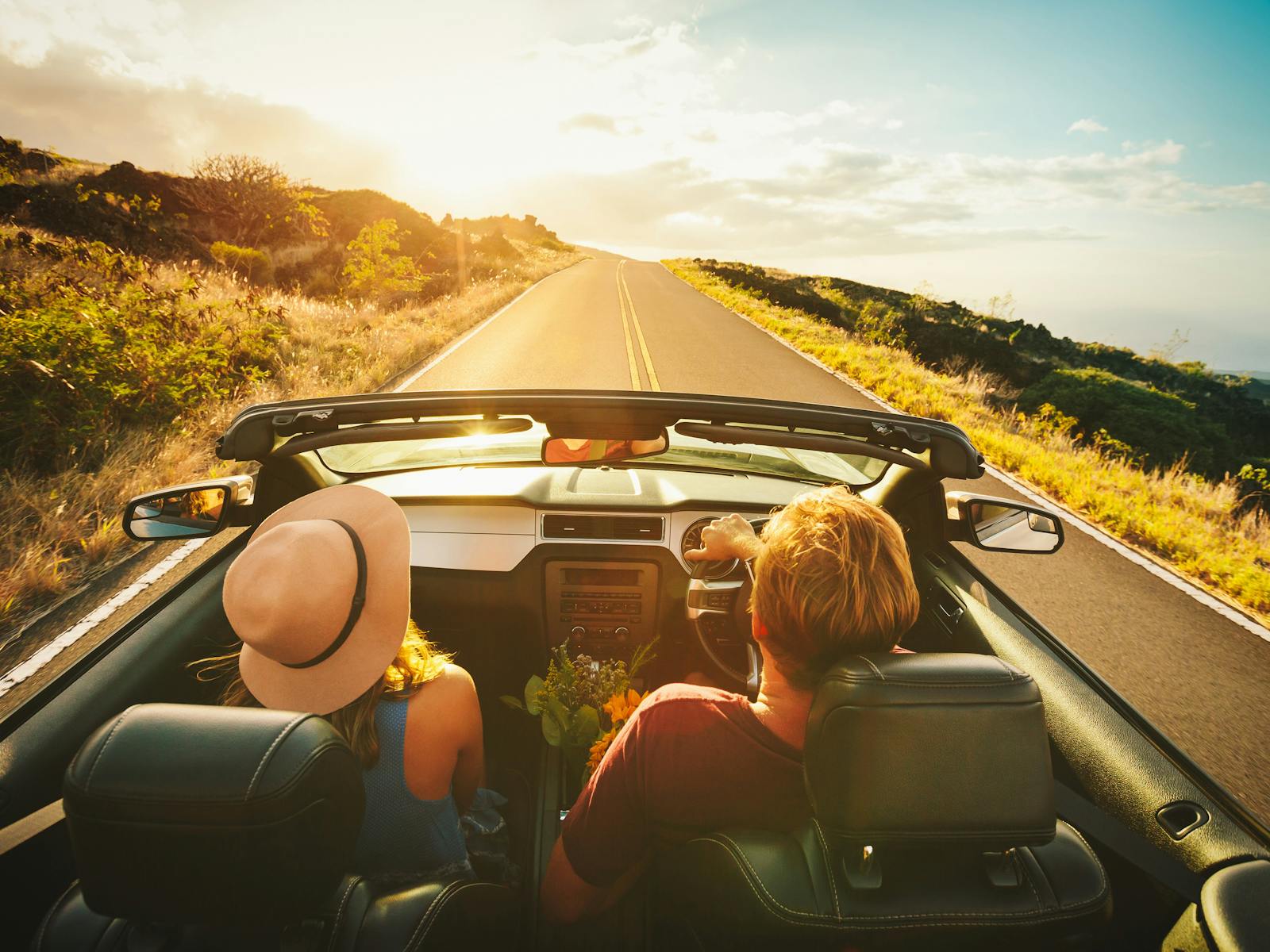 Couple Driving convertible