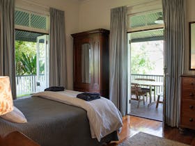 Heritage bedroom with a view to external balcony