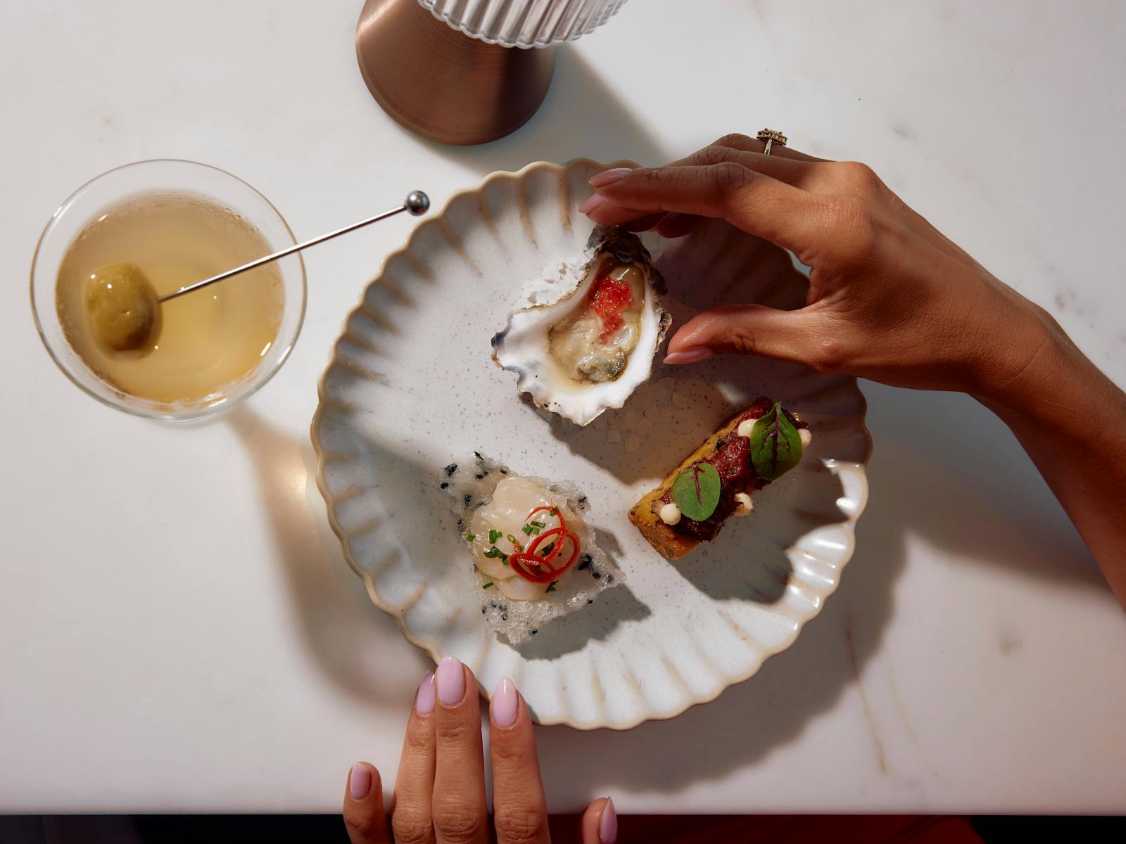 Birds eye view of a plate with three snacks