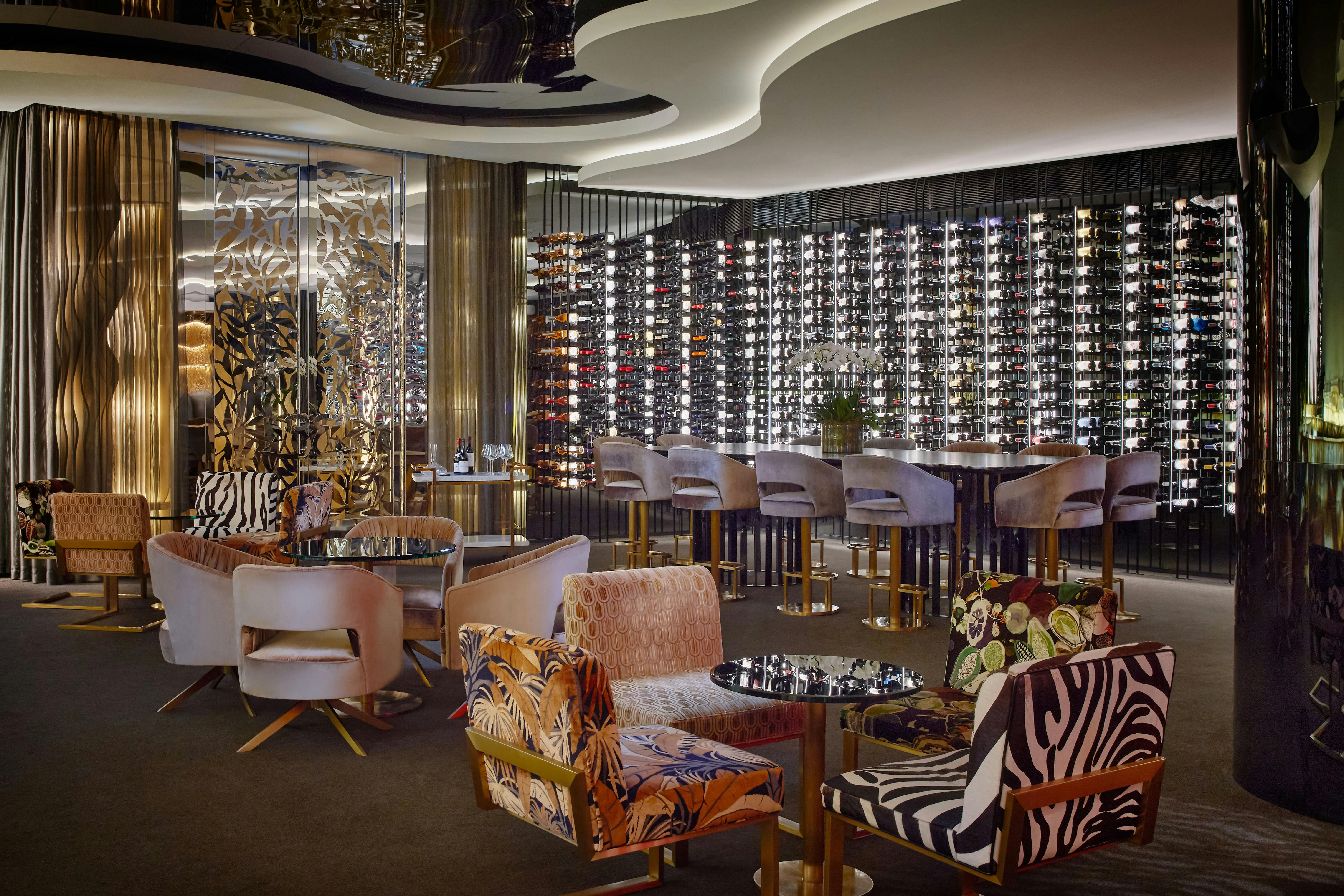 Moody interiors of wine cellar and seating in The Reserve Wine Bar