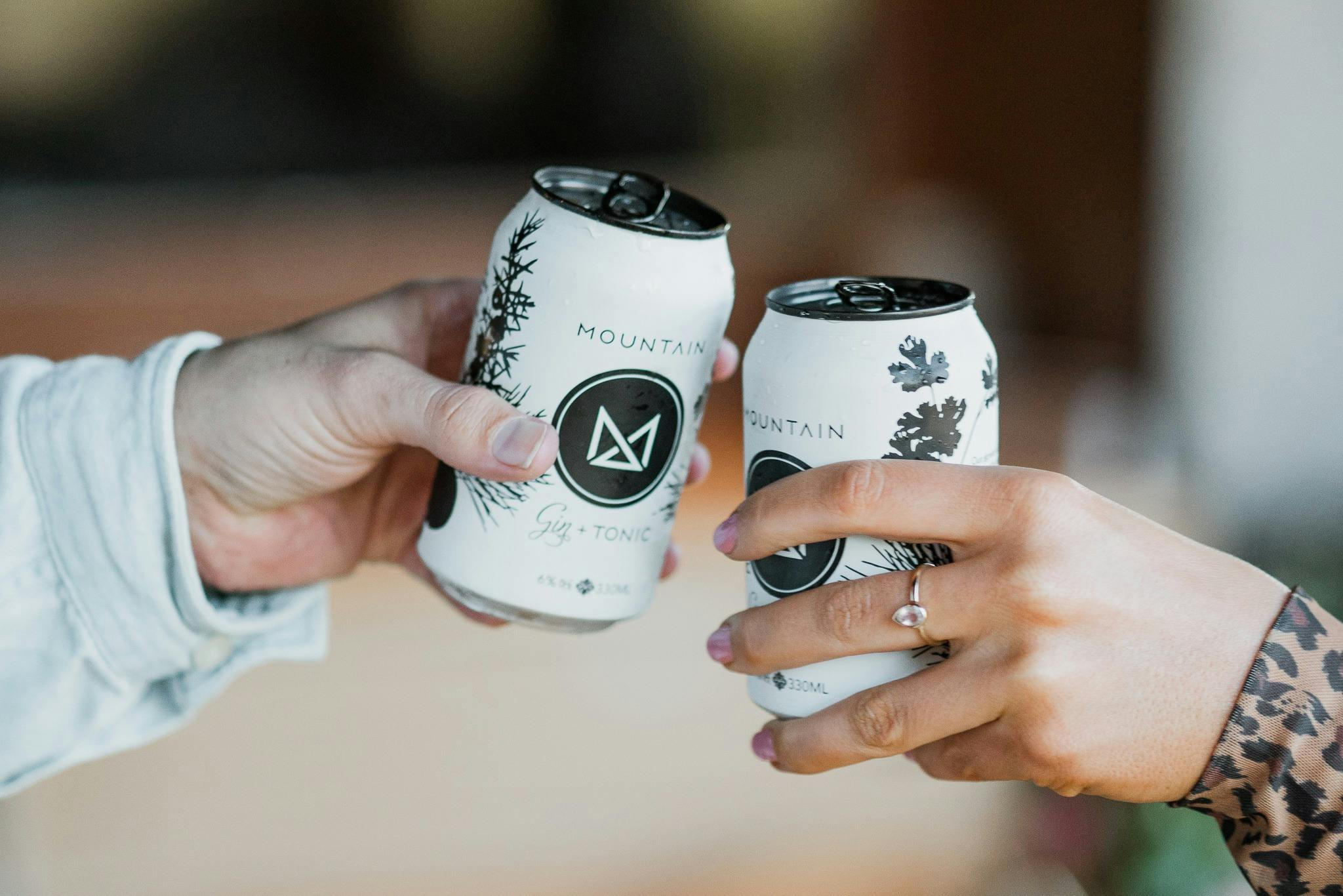 Two cans of Mountain Gin & Tonic