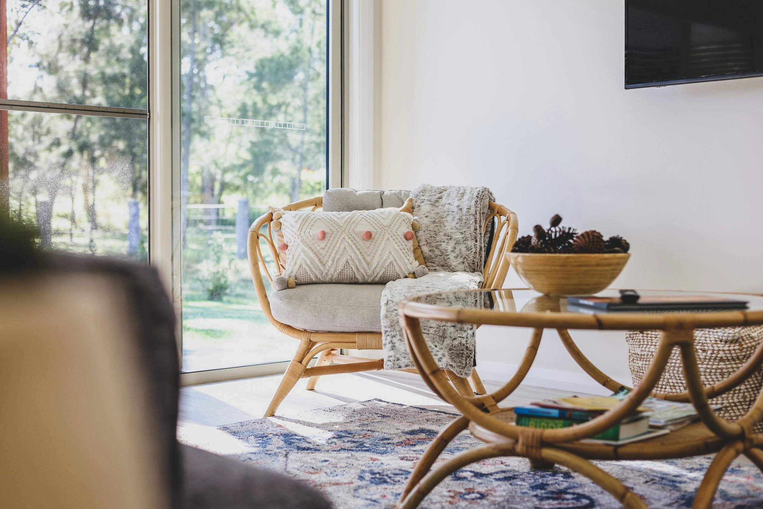 Casual table and cane coffee table with bowl in centre