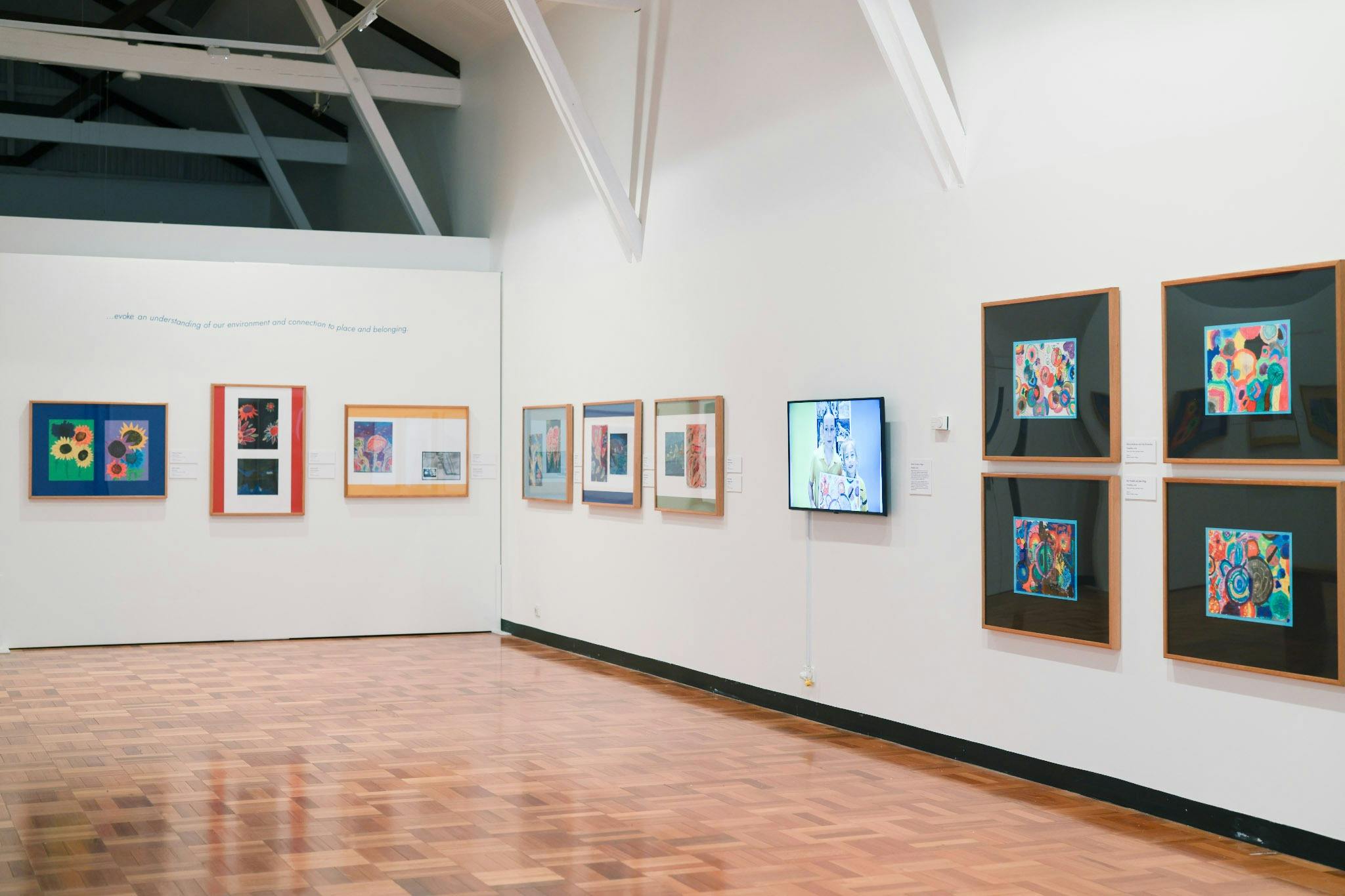 Gallery wall with multiple artworks by northern Tasmanian primary school students
