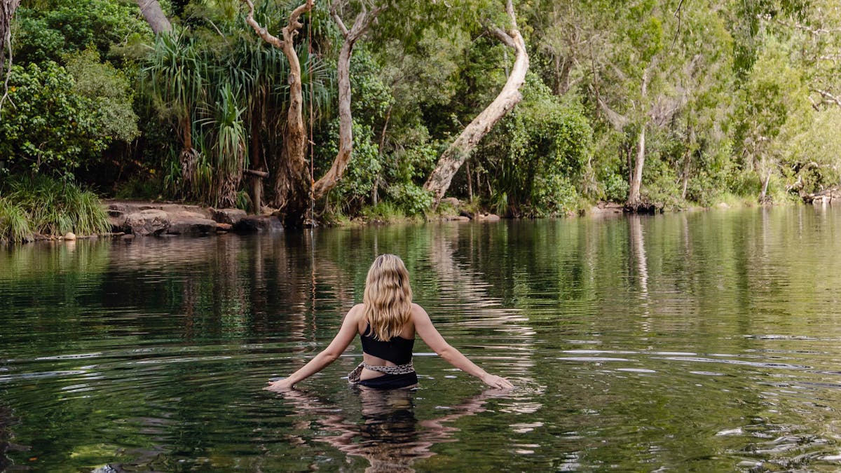 swimming in a rainforest creek