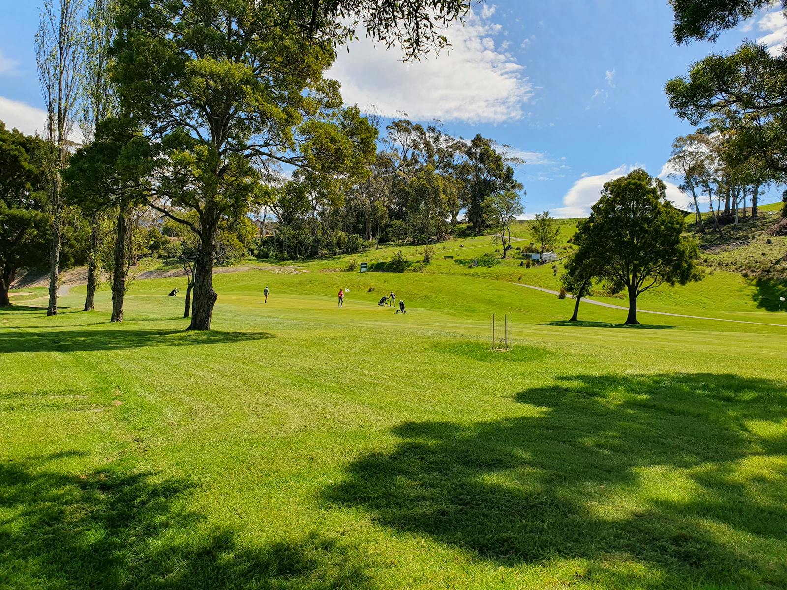 Open green fairways at Kingston Beach Golf Club