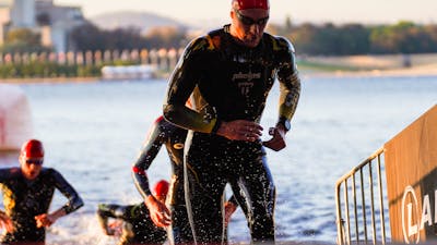 Swimmers exiting the water