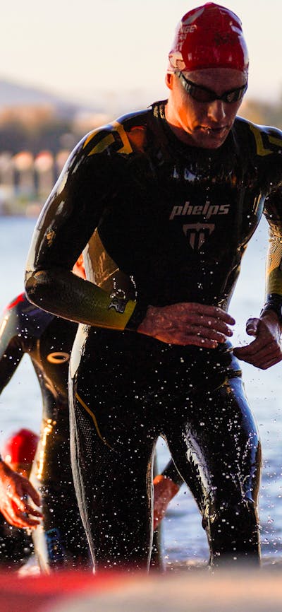 Swimmers exiting the water