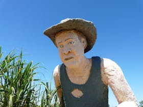 The Hand Cane Cutter Statue even has a hole in his Jackie Howe singlet!