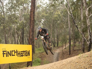 Mountain bike rider jumping