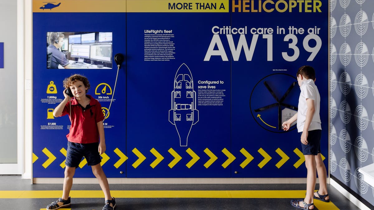 Two children engaging with the interactive exhibits