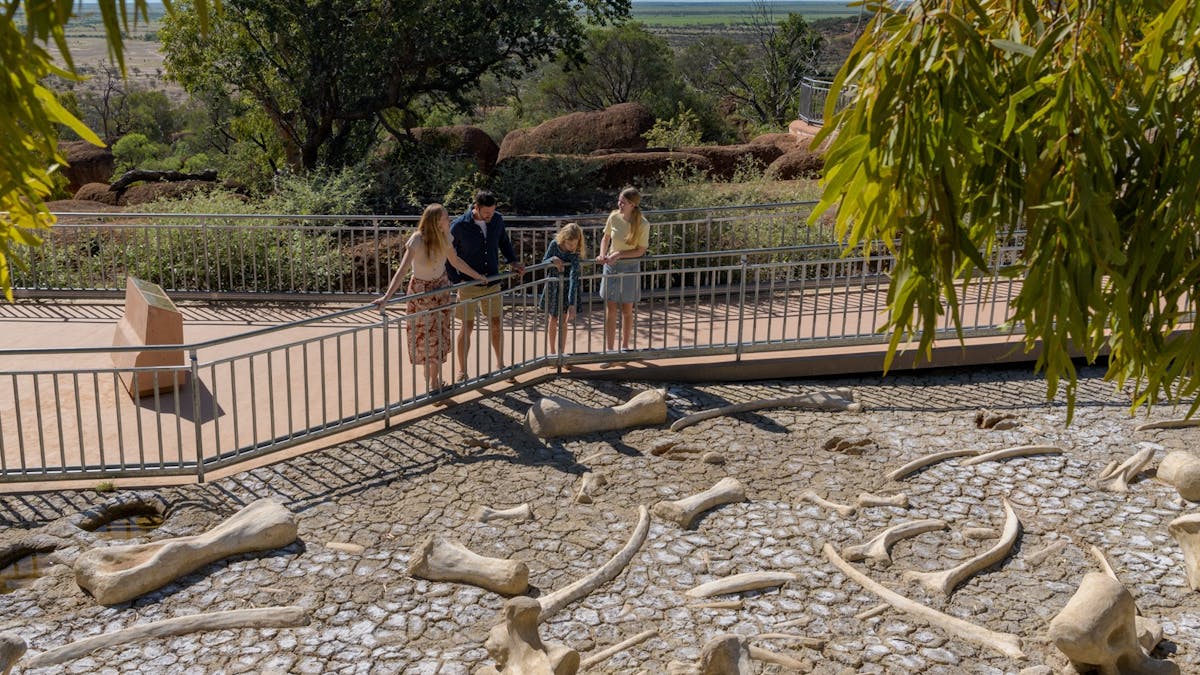 Guests at the "Death in the Billabong" exhibit at Dinosaur Canyon