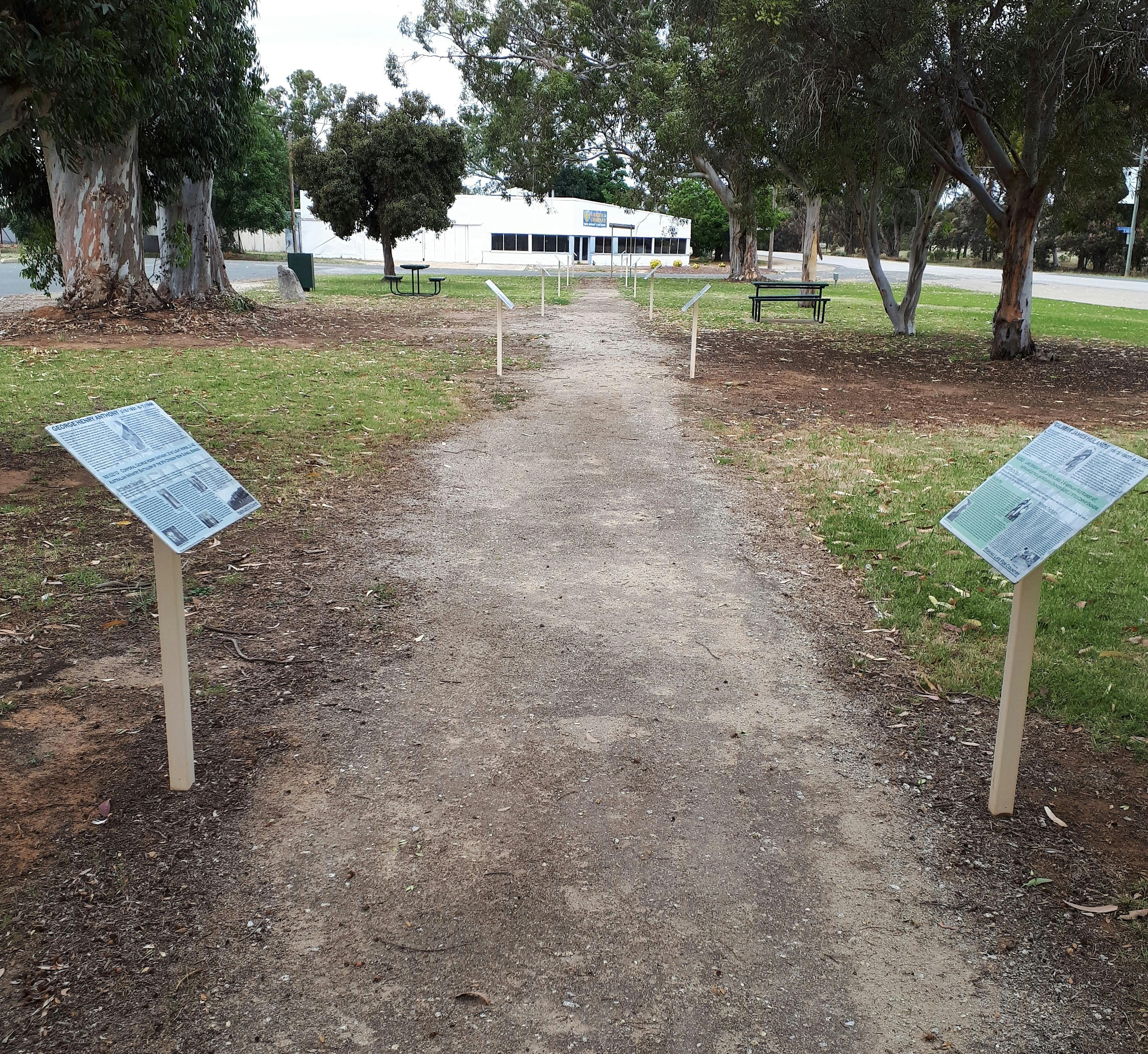 Walking path with two storyboards on local history