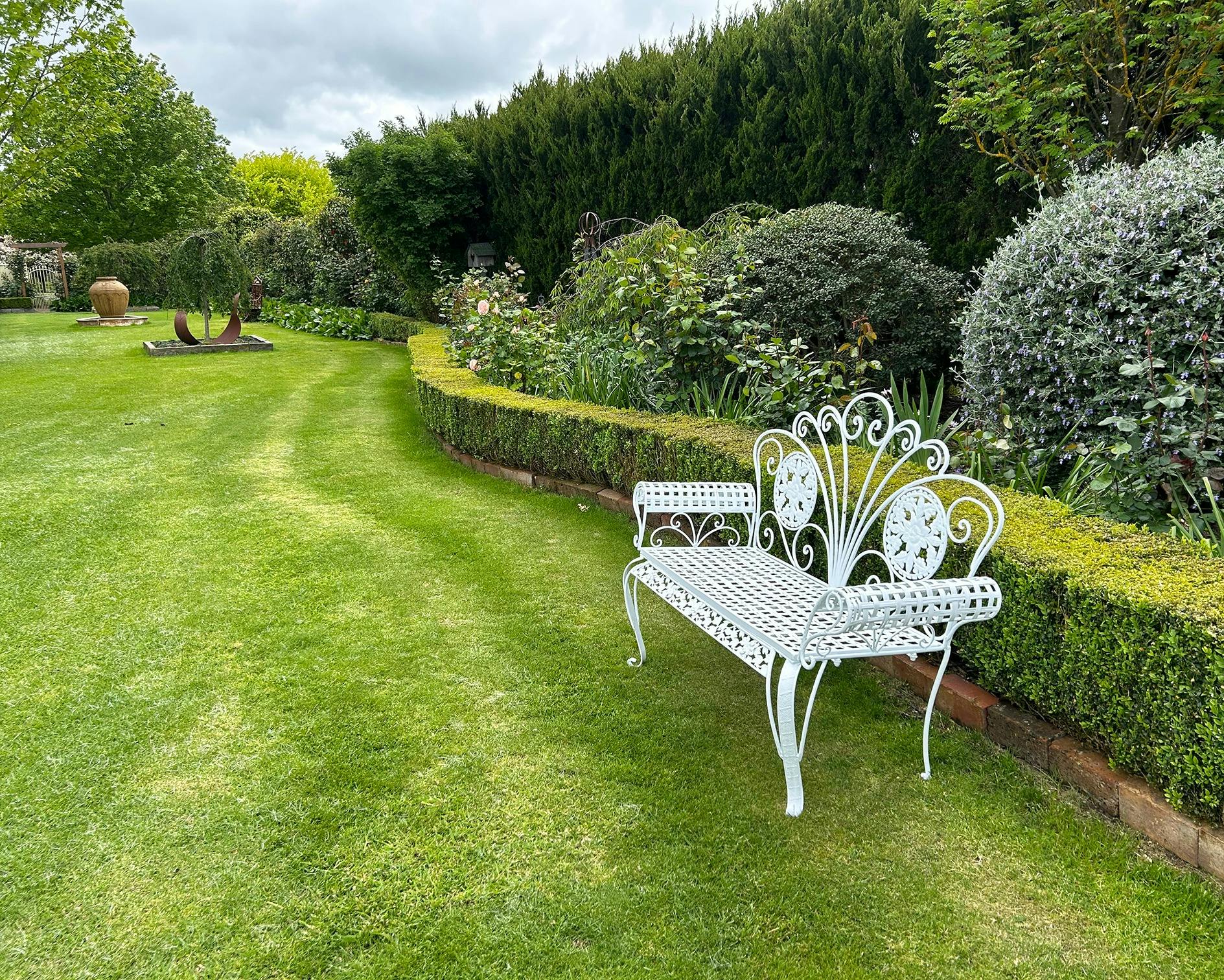 Open Gardens Victoria - Hanami,  lawn and ornate garden seat