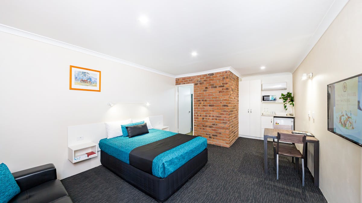King room, recently renovated, lounge chair, table & chairs, smart tv, aircond, mwave, kettle, toast