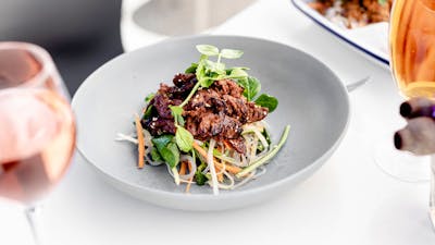 Lemon grass & ginger braised beef cheek w/ sweet potato noodles & crunchy vegetables