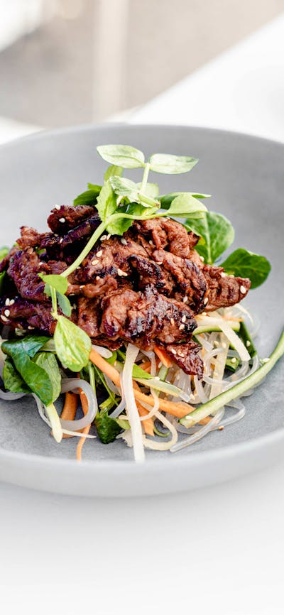 Lemon grass & ginger braised beef cheek w/ sweet potato noodles & crunchy vegetables