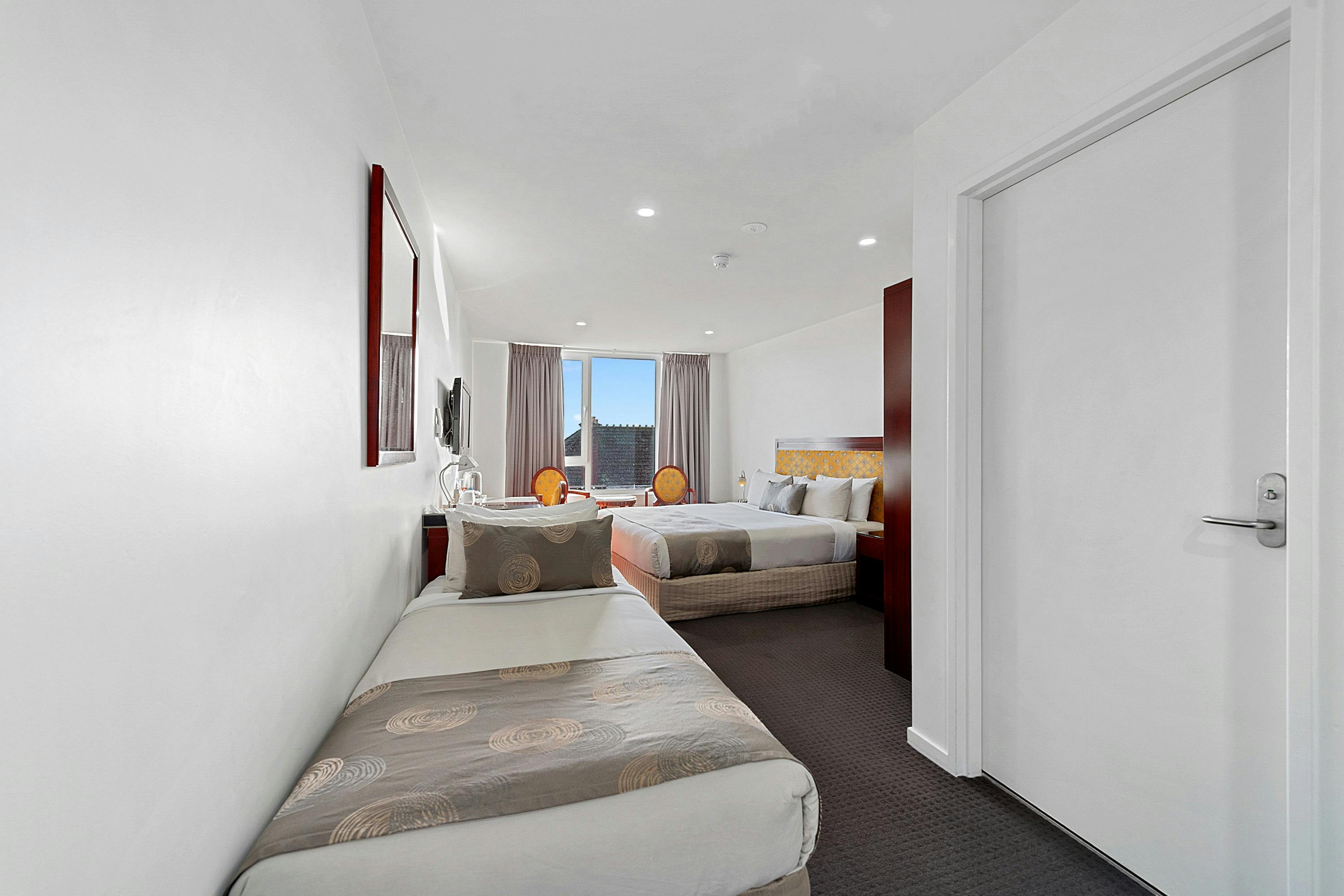 Twin Room is the only room accommodating three people - one king size bed and one single bed.
