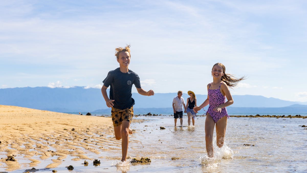 Low Isles family on beach