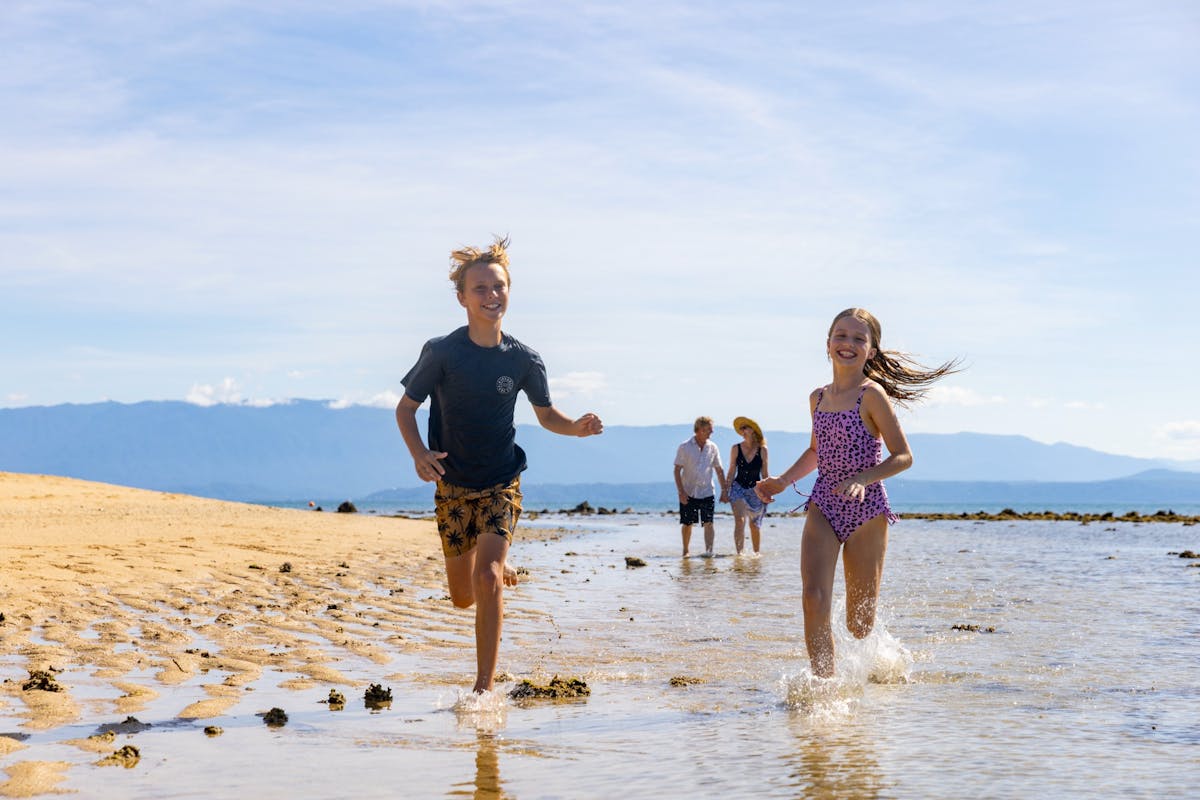 Low Isles family on beach