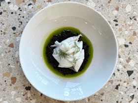 Ottelia Coonawarra Poached squid, black rice and dill oil