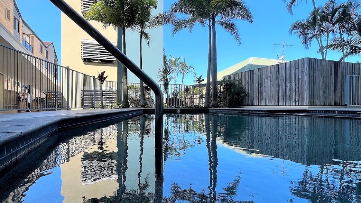 Pool area with spa