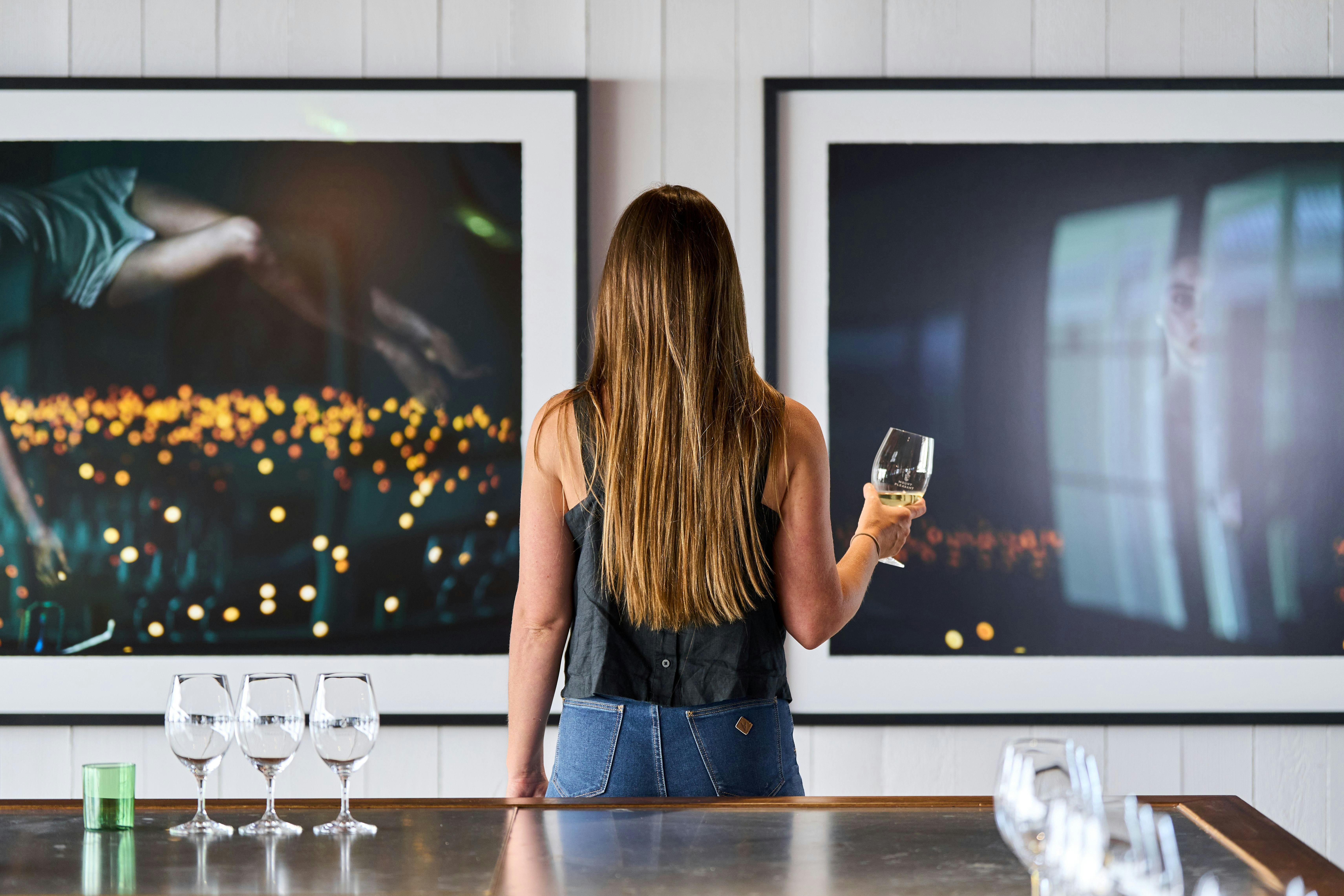 Guest viewing artwork in homestead