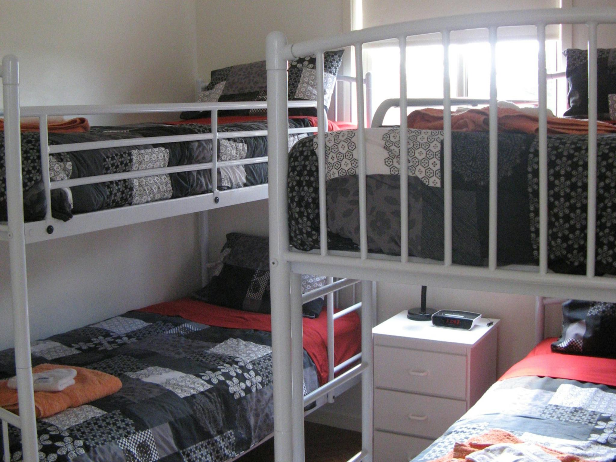 Room with two sets of bunk beds