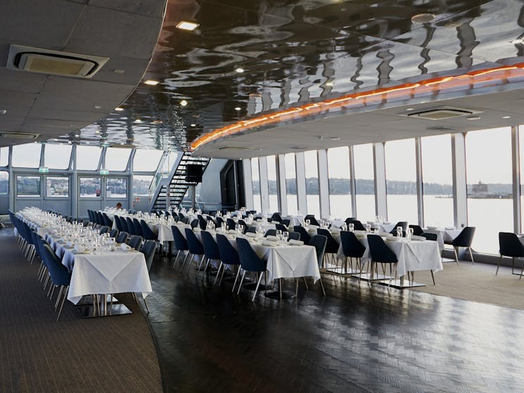 Clearview glass boat’s premium lunch area featuring floor-to-ceiling glass windows.